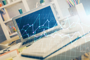 Multi exposure of forex graph and work space with computer. Concept of international online trading.