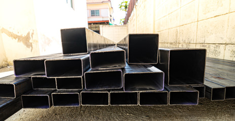 Group of different square steel metal tube