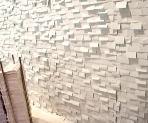small pieces of white paper created texture on the wall