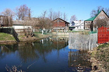 Wooden houses on the outskirts of the Russian city of Pechora. April 2019