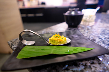 Luxury food in a spoon Salmon Avocado