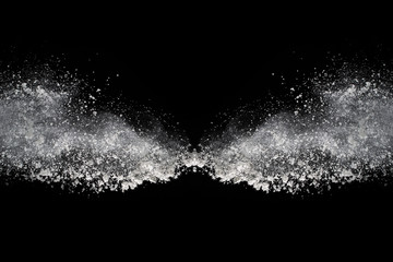 White powder explosion on black background.