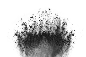 Black powder explosion on white background. 
