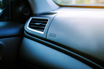 Air bag logo on dashboard in new modern car