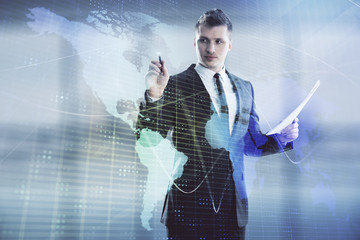 Businessman and world map hologram. Double exposure. Concept of international finance