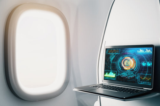 Laptop closeup inside airplane with technology picture on screen. Technology concept. 3d rendering.