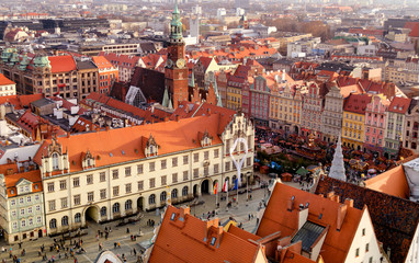 Fototapeta na wymiar Wroclaw main square Rynek with Traditional Festive Christmas market. View from the top of central Tower. Poland.