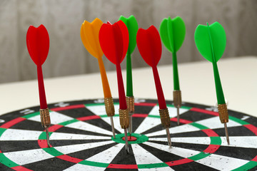 colorful dart arrows, dart sport and dart arrows on dart board,