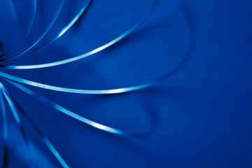 Disfocused blurred toned in color of the year 2020 classic blue texture paper background.