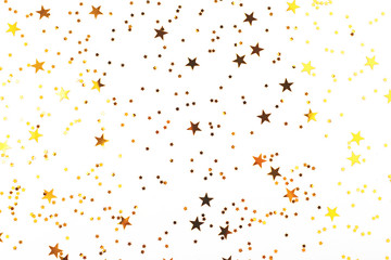 Falling star shape confetti on white background. Flatlay, top view. 