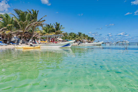 Panoramic of beach, water, boats and ships