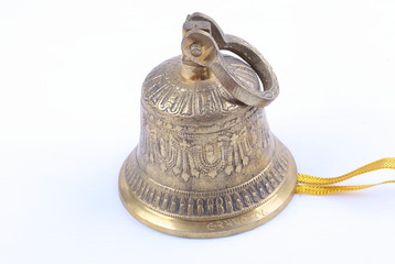 Golden bell on white background