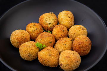 Deep Fried Risotto Balls with herbs