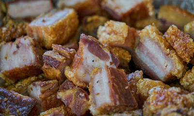 Torreznos dish cut into pieces and ready to eat. Torreznos are a typical meal from Soria, Spain, consisting of fried pork bacon.
