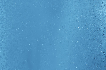 Fototapeta premium abstract drops glass background / texture fog rain, seasonal background, clear glass with water