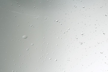 wet glass background condensate / abstract rain, drops texture on transparent glass