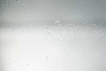 wet glass background condensate / abstract rain, drops texture on transparent glass
