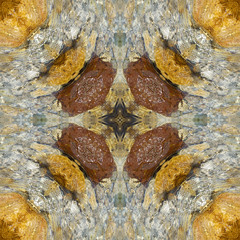 Polysimmetrical tracery made of clear water and boulders. The multiaxial kaleidoscope based on yellow and brown river stones No.3