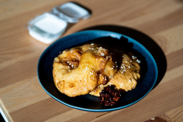 Fried Pineapple Fritters Caramelized with Cinnamon and Sesame Seeds.