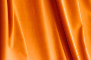 Abstract orange fabric background, velvet textile material for blinds or curtains, fashion texture...