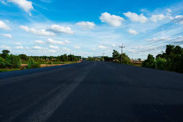 The road being built in the atmosphere of blue sky and white.