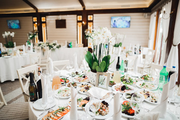 Interior of a restaurant prepared for wedding ceremony