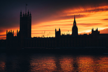 House of parliament in London, sunset sky,