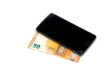 Mobile phone with broken display and fifty euros bill isolated on white.