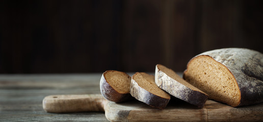 sliced bread on  wooden table