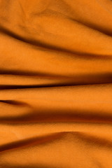 Cotton fabric, Orange fabric crumpled texture.