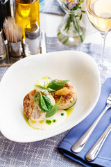 Fish cutlets in restaurant serving