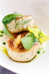 Fish cutlets in restaurant serving