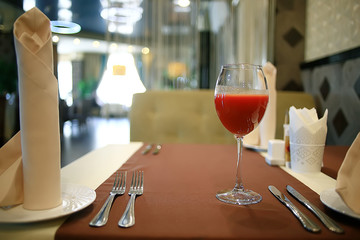 fork and knife serving in the interior of the restaurant / table in a cafe, food industry catering, menu