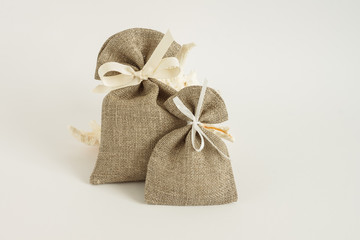 Decorative bags. Made of linen fabric. White background.