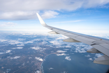 airplane with dalian city skyline