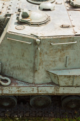 Fototapeta na wymiar Design elements and details of the old Soviet heavy self-propelled artillery ISU-152. Military green camouflage metal background
