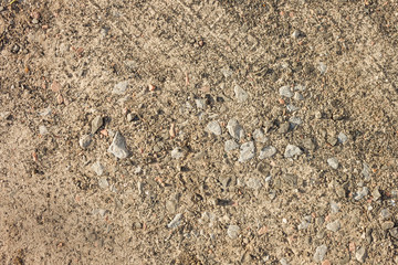 Ground road with fine gravel View from the top. Close-up Background