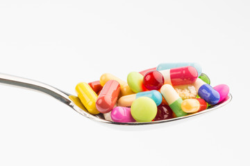 many tablets on spoon