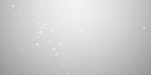 Sparse snowfall Christmas background. Subtle flyin