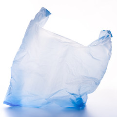 Empty blue polyethylene bag on white background