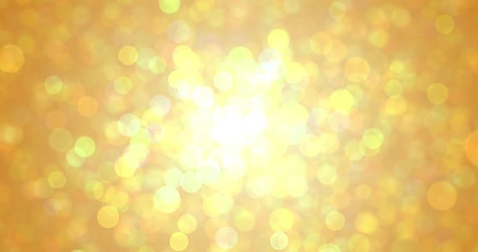 Gold light flare bokeh effect on shiny sparkling glitter background. Golden glittering sparkle flares and sun light shimmer glow blur