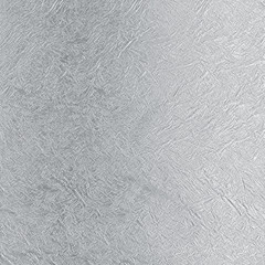 The wall with the applied pattern of silver color in the form of small embossing and scratches