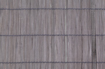 Photo of bamboo mat as abstract texture background side view