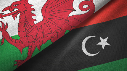 Wales and Libya two flags textile cloth, fabric texture