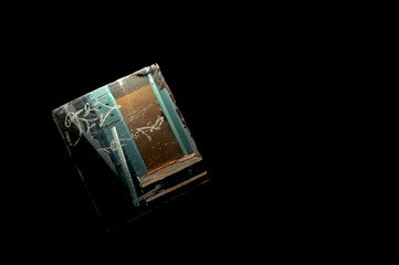 Isolated Boarded Window in Darkness