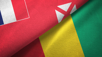 Wallis and Futuna and Guinea two flags textile cloth, fabric texture
