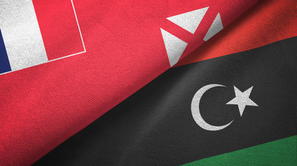 Wallis and Futuna and Libya two flags textile cloth, fabric texture