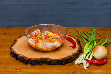 fresh chicken meat on wooden background