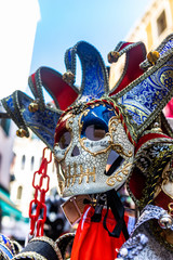 Fototapeta na wymiar Carnival mask on the streets of Venezia