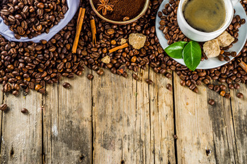 Cup of espresso with coffee beans